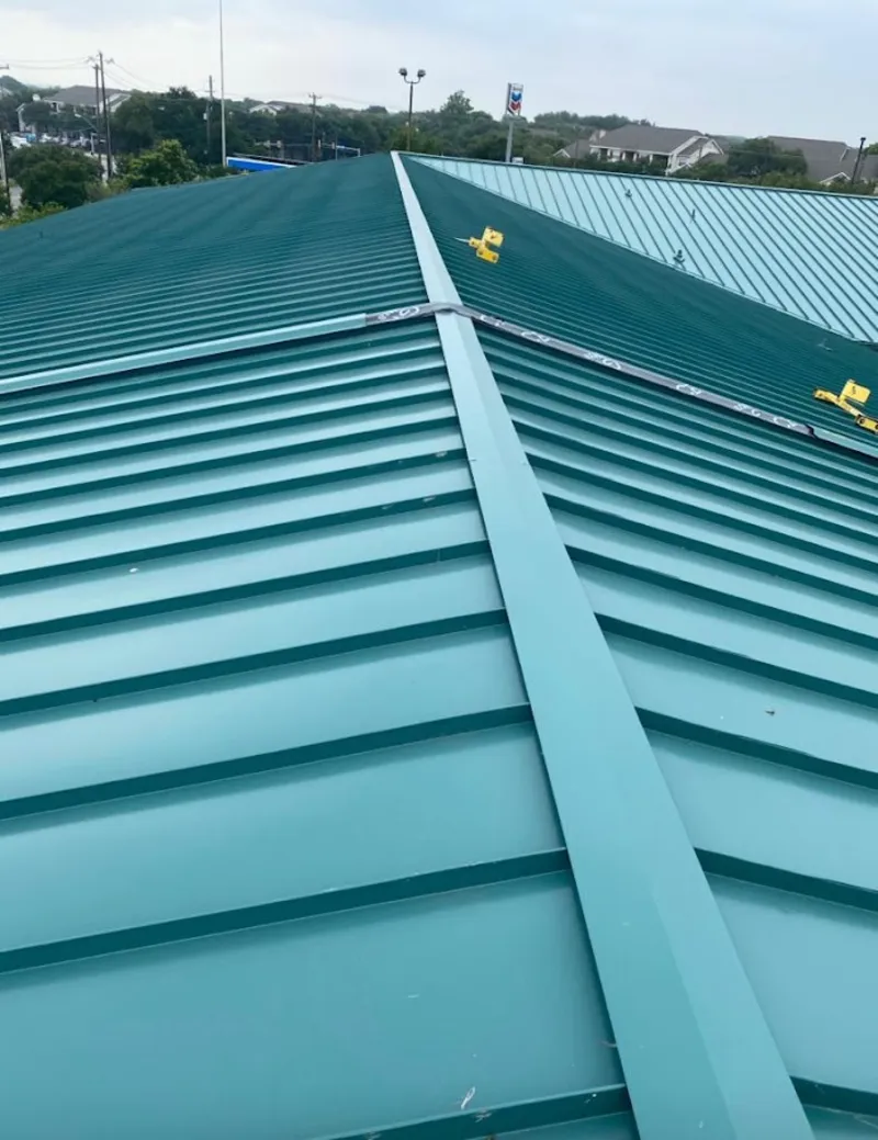 Green commercial metal roof ridge and valley for Metal Roof Repair in Amarillo